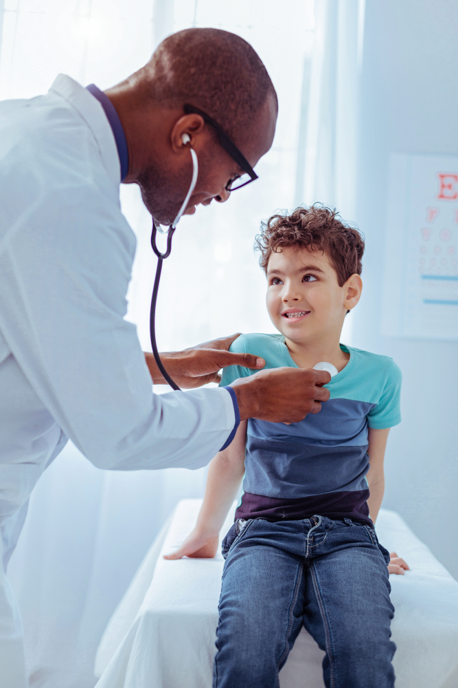 doctor with boy, doctor and boy at hospital, patient and doctor